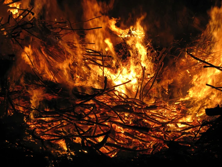 a fire that is burning in the night, hurufiyya, solstice fire, thumbnail, festivals, multiple stories