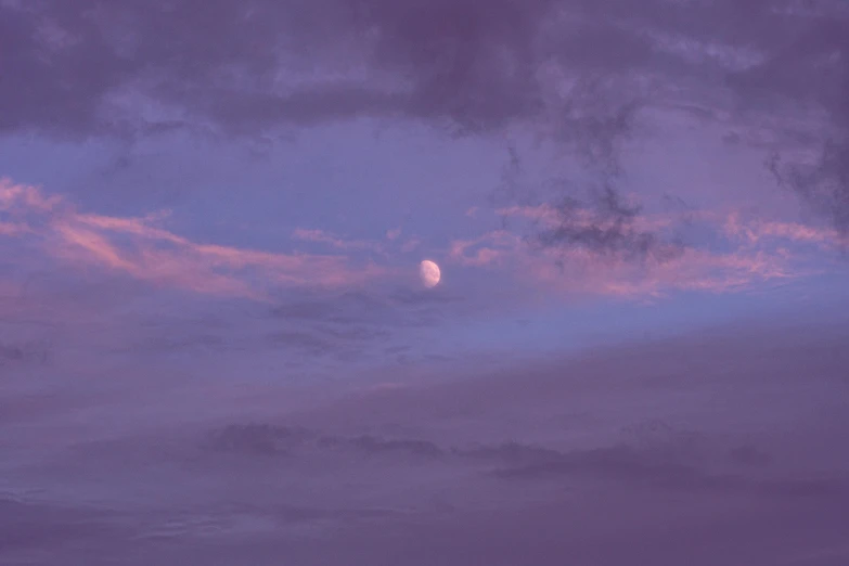 a full moon is seen through a cloudy sky, pexels contest winner, aestheticism, red purple gradient, lavender blush, second colours - purple, light purple