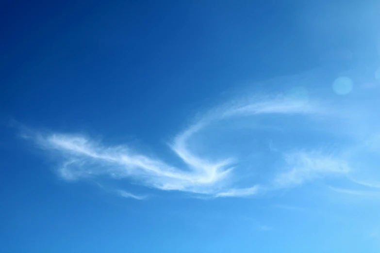 a person is flying a kite in the sky, wispy clouds in a blue sky, 15081959 21121991 01012000 4k, swirling wispy smoke, low angle 8k hd nature photo