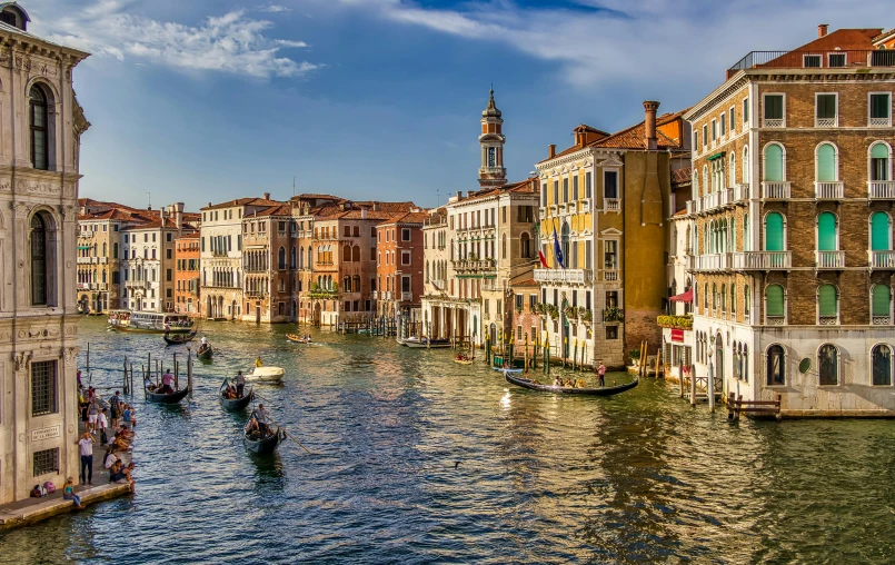 a canal filled with lots of boats next to tall buildings, pexels contest winner, renaissance, venice biennale's golden lion, thumbnail, afternoon light, panoramic