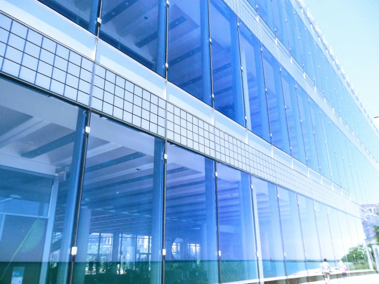 a man riding a skateboard down a sidewalk next to a tall building, a digital rendering, unsplash, glass panes, brightly lit blue room, executive industry banner, square