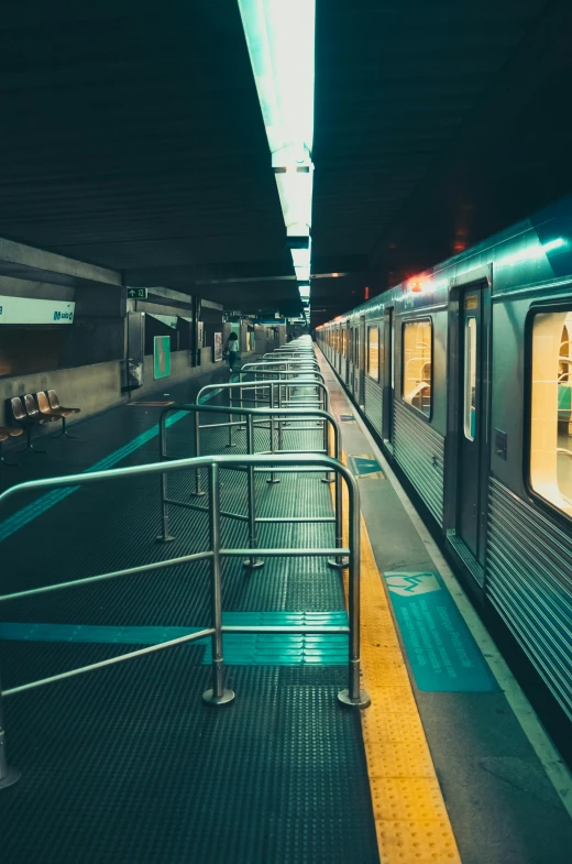 a subway train pulling into a train station, a picture, by Alejandro Obregón, unsplash contest winner, hyperrealism, teal lights, square lines, bay area, waiting