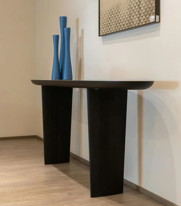 a black table with two blue vases on it, an abstract sculpture, by Theo Constanté, console, 2 1 st century, oak, ( ( ( bauhaus ) ) )