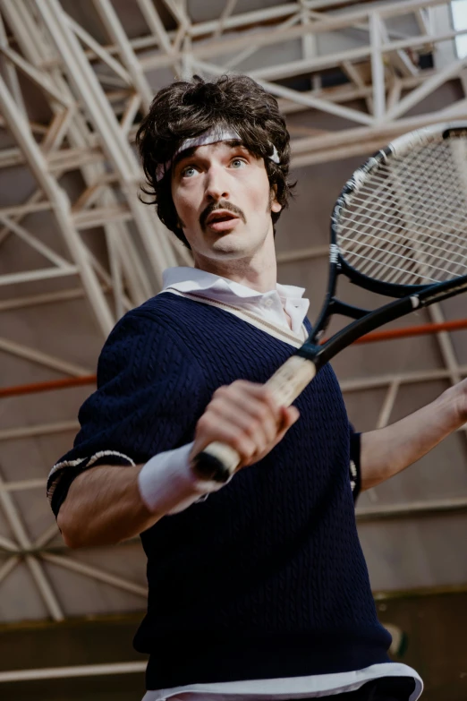 a man holding a tennis racquet on top of a tennis court, inspired by Sergei Sviatchenko, renaissance, adam driver behind, nathan fielder and groucho marx, blue steel, dressed in 1970s menswear