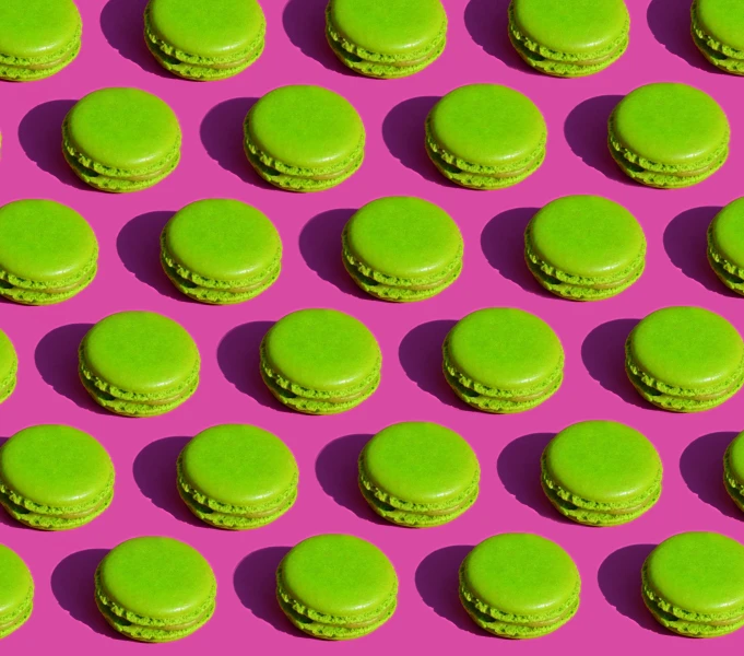 many green macarons on a pink surface, by Julia Pishtar, pop art, alexandre bourlet, repetition, panels, saatchi art