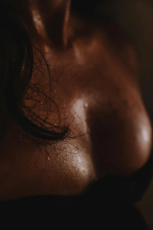 a close up of a woman's breast, an album cover, inspired by Elsa Bleda, trending on pexels, sweaty wet skin, dark skinned, 4k), muscle