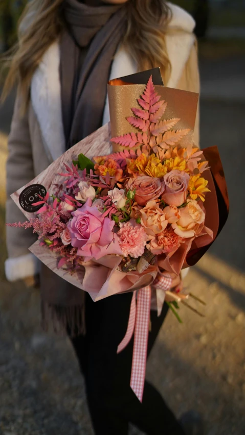 a woman walking down a street holding a bunch of flowers, pexels contest winner, romanticism, pink and orange colors, adorable design, soft - warm, anna nikonova
