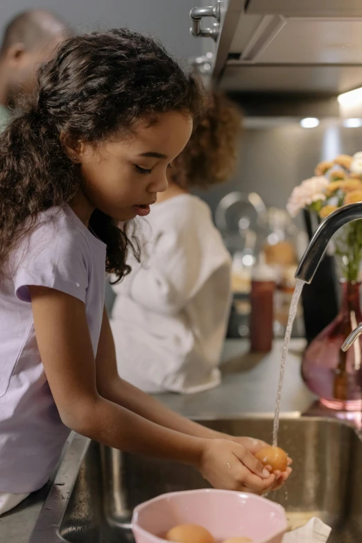 a young girl washing eggs in a kitchen sink, pexels contest winner, food commercial 4 k, fan favorite, realflow, taps with running water