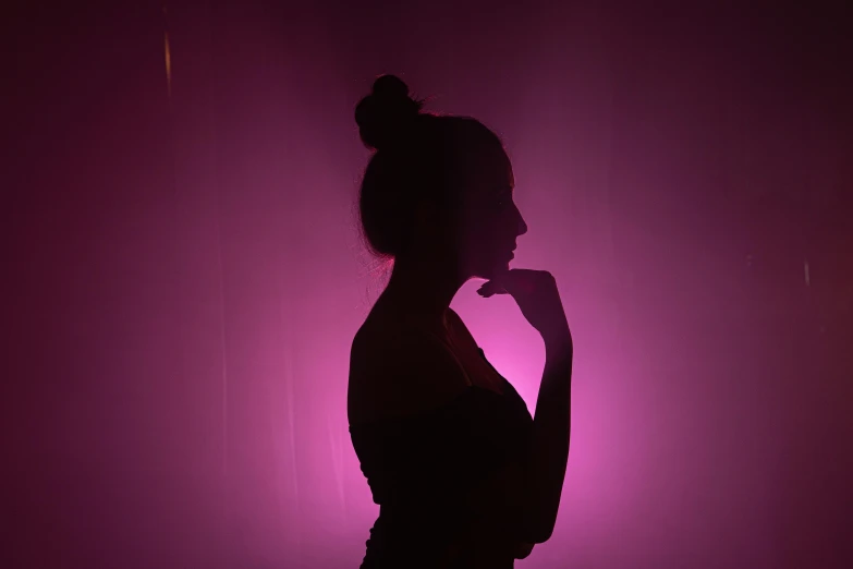 a silhouette of a woman in a dark room, pexels contest winner, bright pink purple lights, profile posing, haze, instagram post