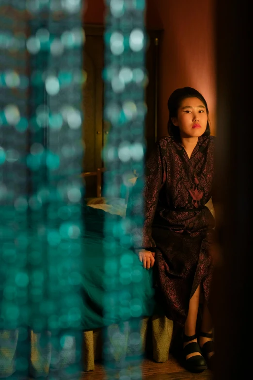 a little girl sitting on a chair in a room, a portrait, inspired by Feng Zhu, unsplash, neo-figurative, night setting, elegant japanese woman, still frame from a movie, looking serious