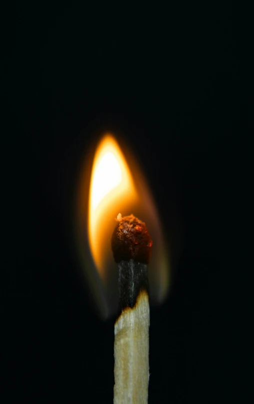 a close up of a lit matchstick on a black background, pexels, instagram post, arson, on a gray background, 15081959 21121991 01012000 4k