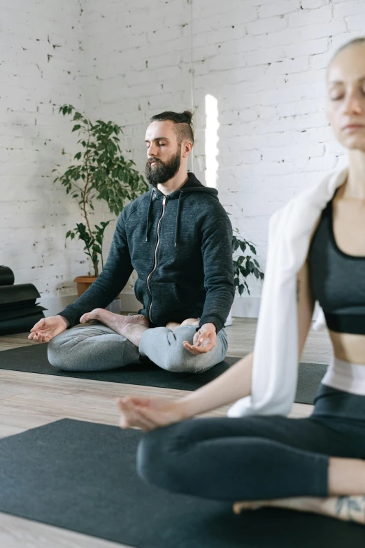 a man and a woman doing yoga together, pexels contest winner, renaissance, melbourne, in a dojo, low quality photo, meditating pose