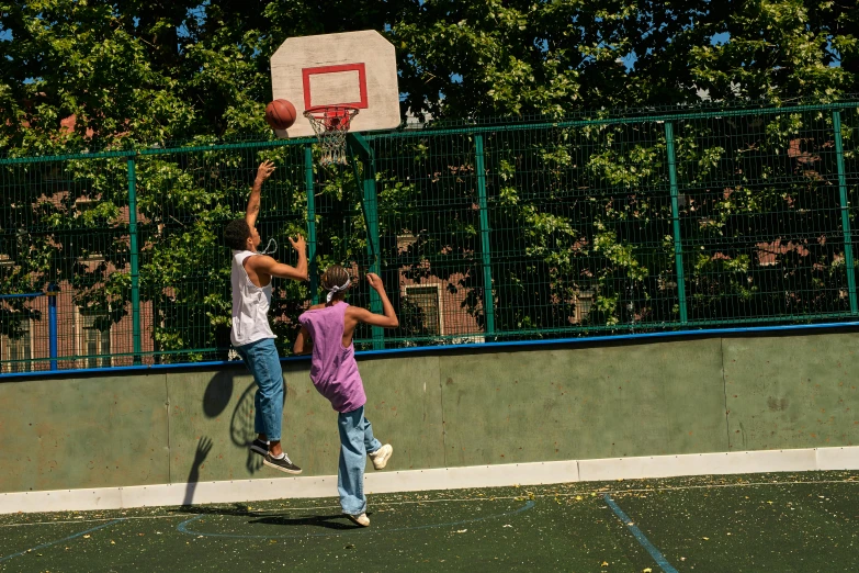 a couple of kids playing a game of basketball, by Bernard Meninsky, pexels contest winner, ashcan school, sunny summer day, shot on sony alpha dslr-a300, harlem, mid air shot