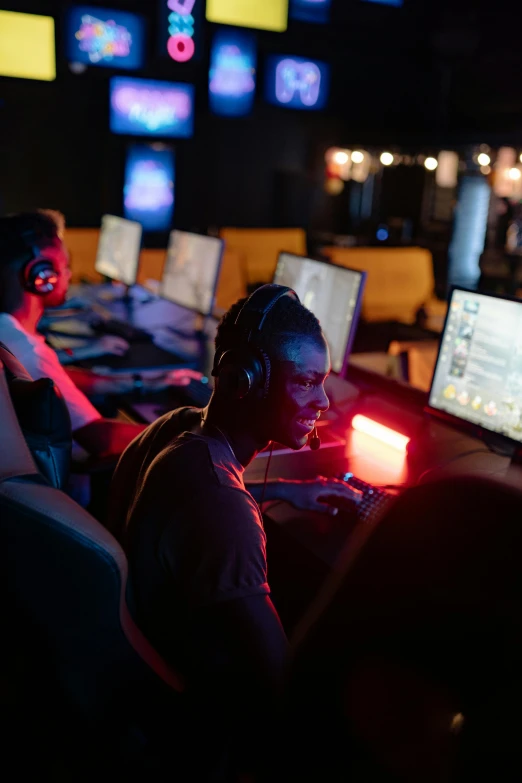 a group of people sitting in front of computers, sierra entertainment games, during the night, thumbnail, squad