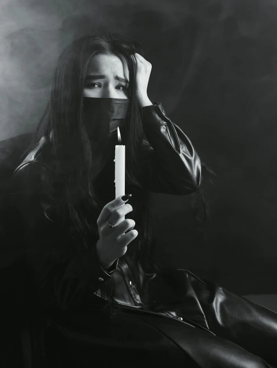 a black and white photo of a woman holding a cigarette, inspired by Tang Sin Yun Sandara, dripping candles, alternate album cover, profile image, instagram picture