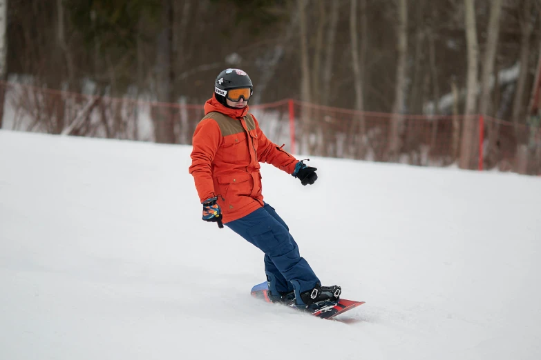 a man riding a snowboard down a snow covered slope, sunday, educational, practice, cornell