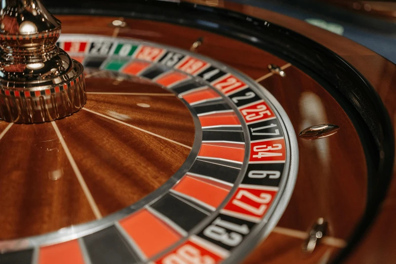 a close up of a roulet wheel on a table, by Carey Morris, pexels contest winner, online casino logo, 15081959 21121991 01012000 4k, thumbnail, headshot