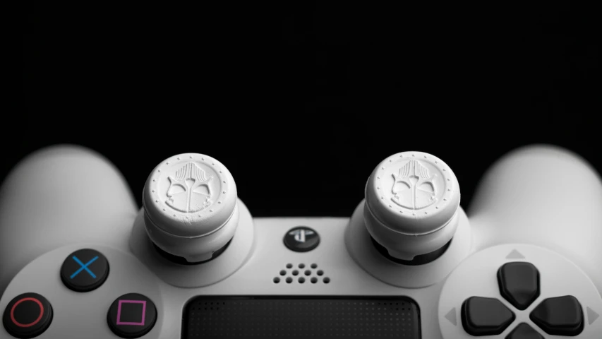 a close up of a video game controller, an ambient occlusion render, inspired by John Button, unsplash, fine art, stamped, white john berkey armor panels, pennywise theme, close up front view