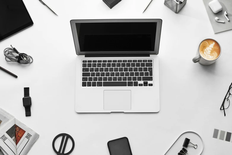 a laptop computer sitting on top of a white table, by Daniel Gelon, pexels, knolling, icon black and white, micropohone, tools