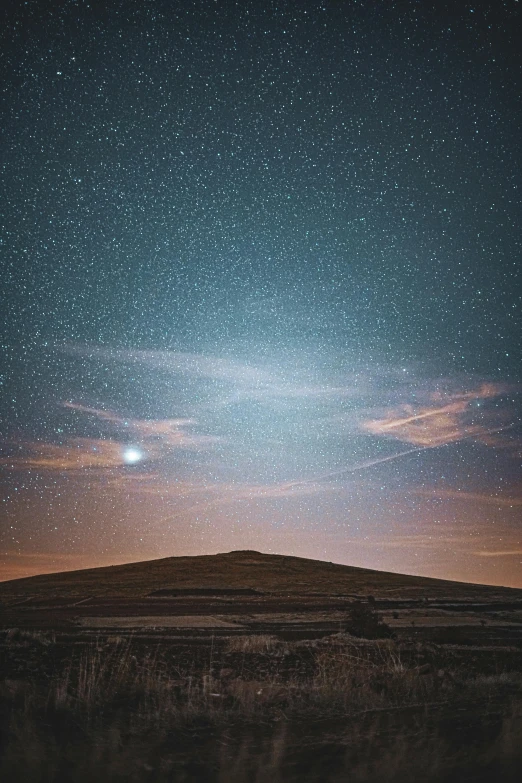 a night sky with stars above a hill, unsplash contest winner, saturn and supermoon in the sky, vast expansive landscape, cloud nebula, pearly sky