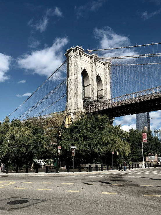 a view of the brooklyn bridge from across the street, pexels contest winner, hudson river school, hyper - detailed color photo, promo image, multiple stories, low angle view