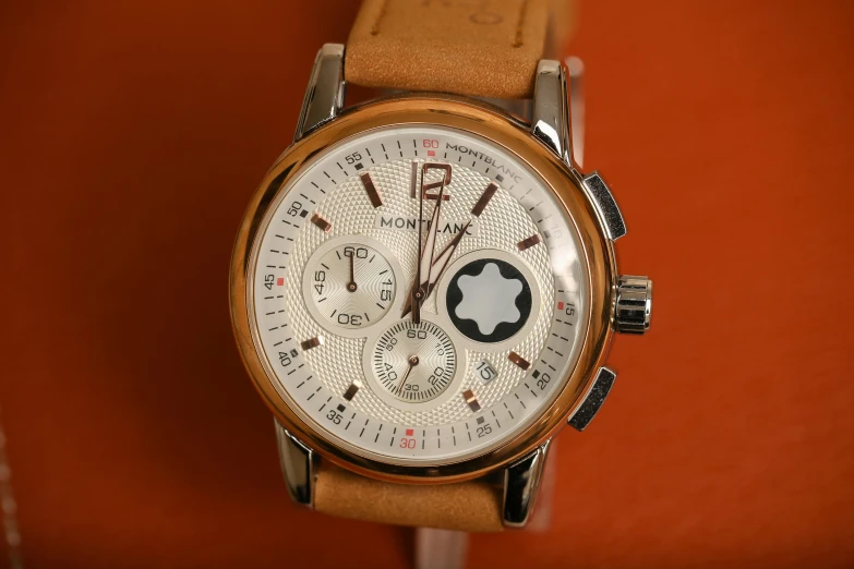 a close up of a watch on a table, by Romain brook, gradient brown to white, top angle view, wolfgang lettl highly detailed, thumbnail