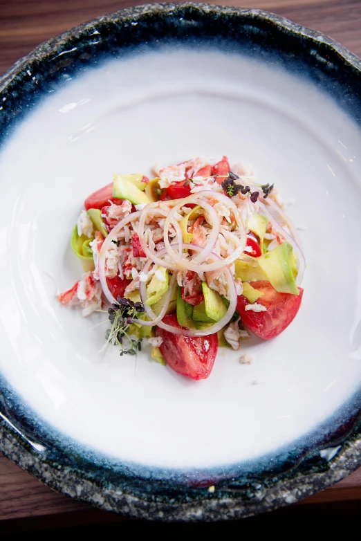 a close up of a plate of food on a table, crab, square, salad, jen atkin