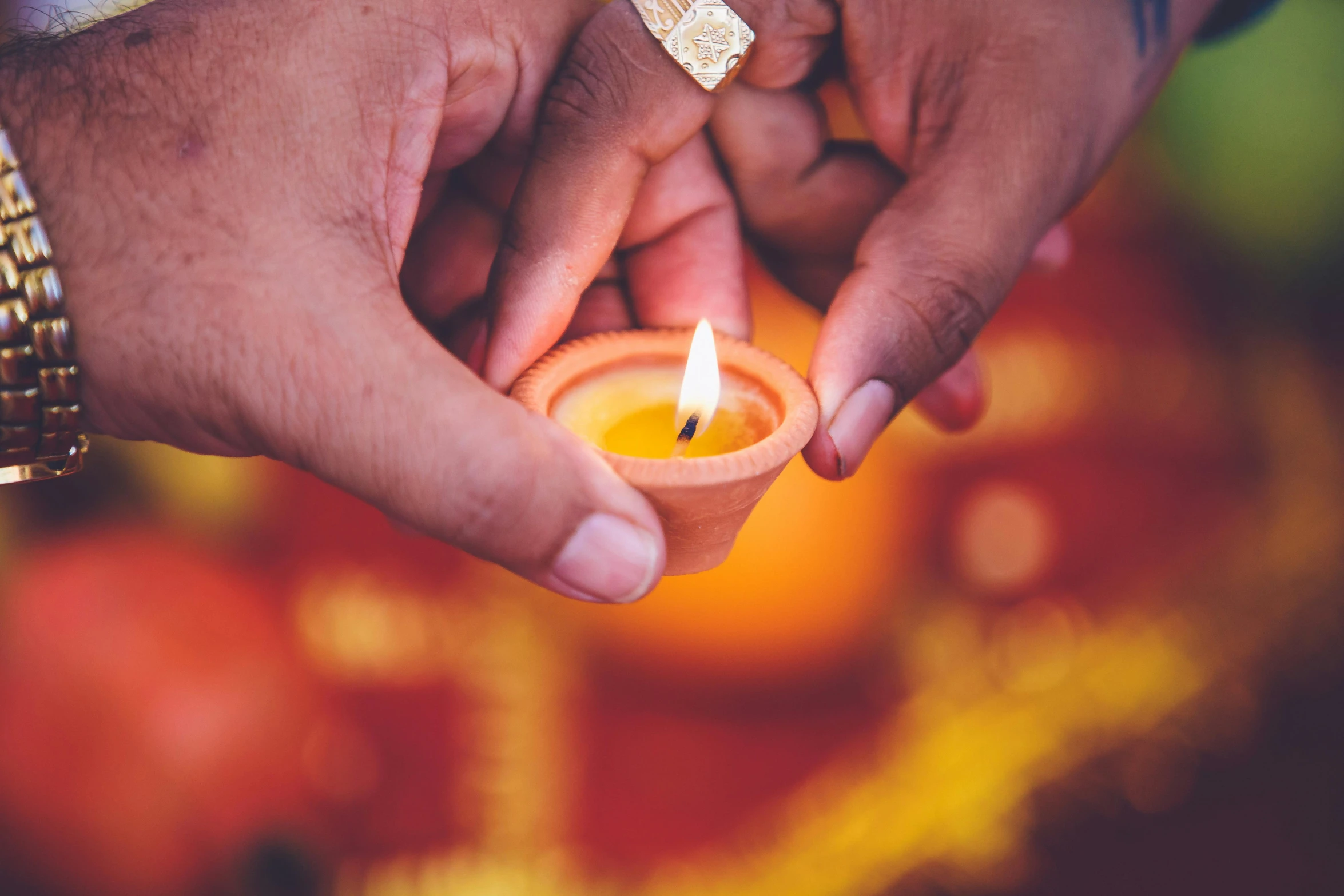 a person holding a lit candle in their hands, hurufiyya, square, brightly coloured, hindu aesthetic, 15081959 21121991 01012000 4k