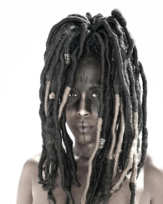 a black and white photo of a man with dreadlocks, inspired by Ras Akyem, afrofuturism, grungy woman with rainbow hair, brown skin like soil, snapchat photo, photo for magazine