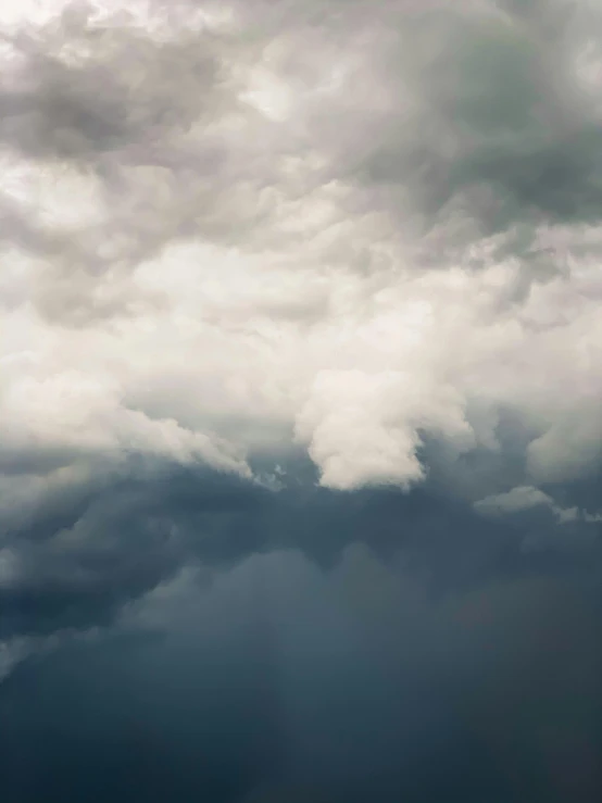 there is a plane that is flying in the sky, by Alison Geissler, unsplash contest winner, romanticism, thunder clouds modernism, todd hido, ignant, by greg rutkowski