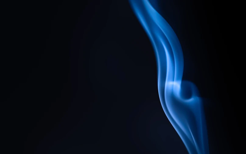 a close up of blue smoke on a black background, by Daniel Lieske, unsplash, minimalism, flame, smooth lines, instagram post, lit from the side