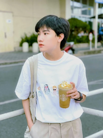 a young man holding a cup of coffee, by Tan Ting-pho, trending on reddit, short sleeves, cute boys, 🐿🍸🍋, profile image