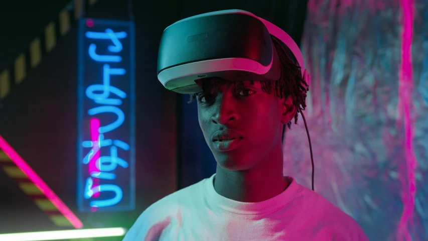a young man wearing a virtual reality headset, unsplash contest winner, afrofuturism, squid game, film still promotional image, young thug, ( ( dark skin ) )