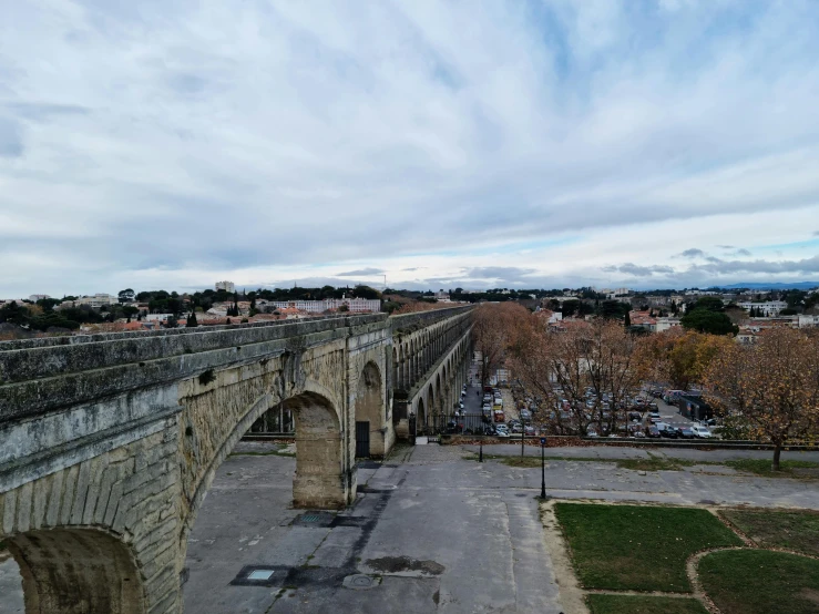 a view of a bridge from the top of a hill, les nabis, colonnade, 4k photo”, 2022 photograph, hyperrealism photo