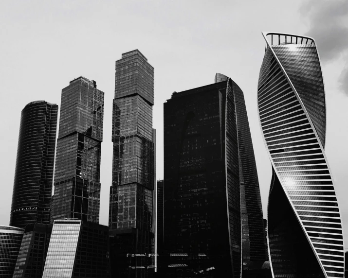 a black and white photo of some very tall buildings, pexels contest winner, hypermodernism, sanctions in russia, curvy build, 000 — википедия, square