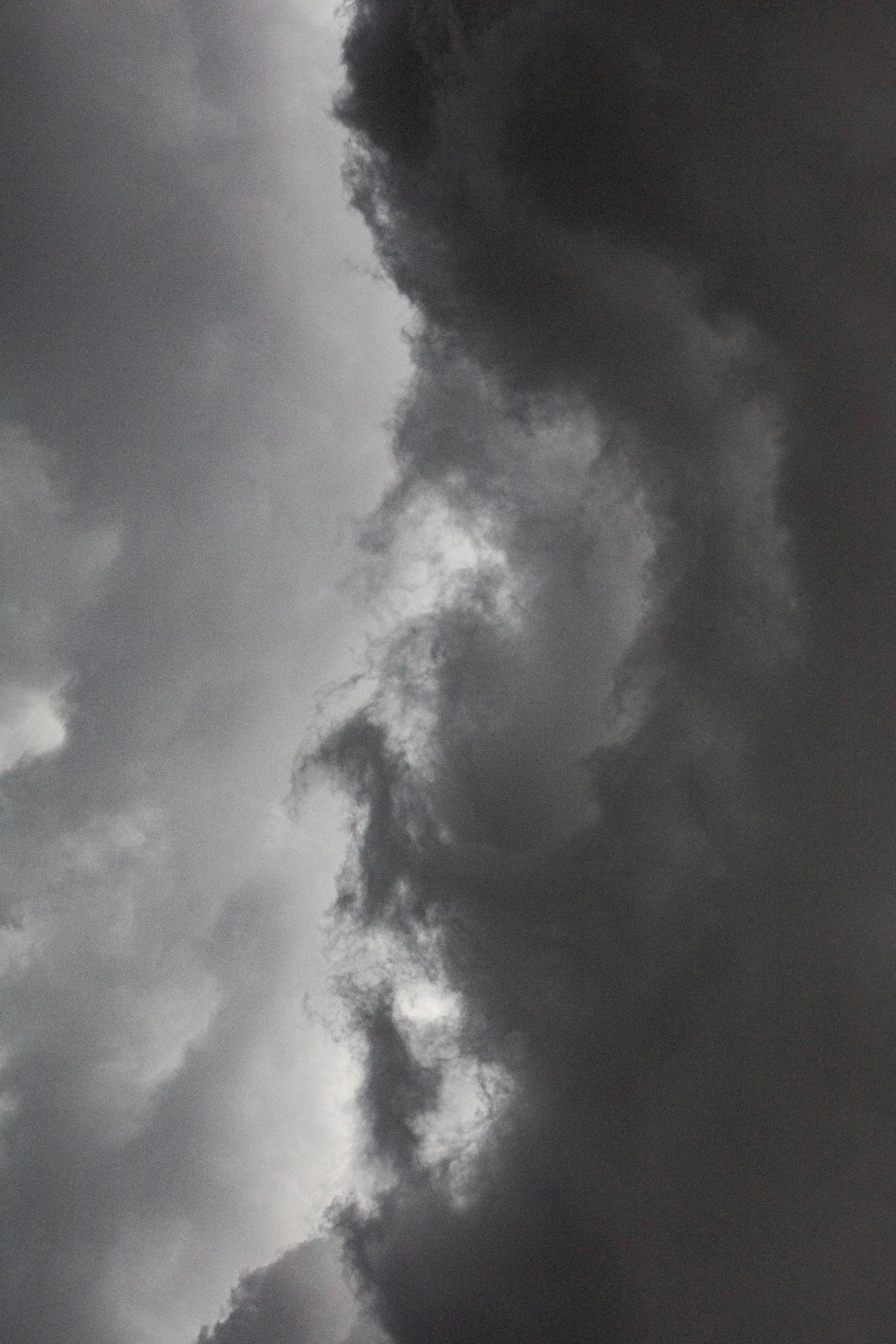 a jetliner flying through a cloudy sky, by Neil Blevins, vorticism, ignant, storms, god looking at me, abstract photography