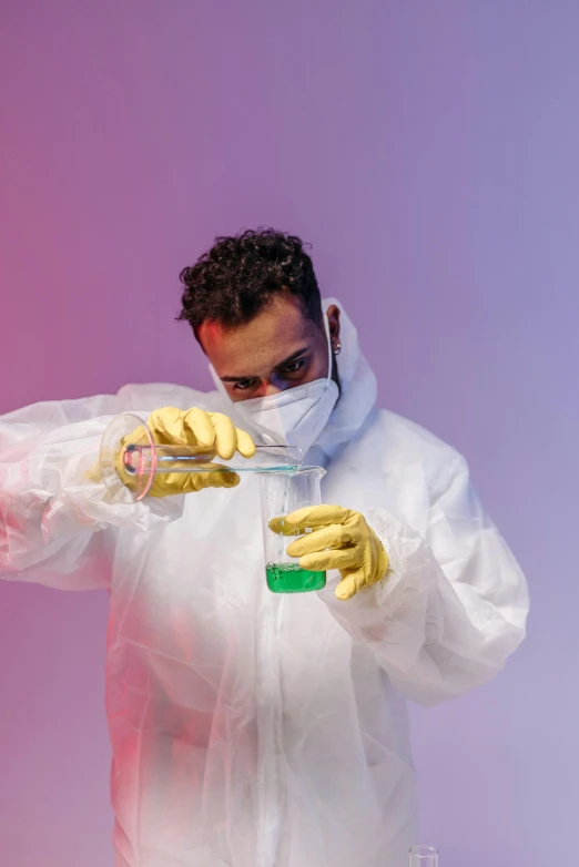 a man in a white lab coat and yellow gloves, an album cover, trending on pexels, beakers of colored liquid, iridescent technology and weapon, tense look, gif