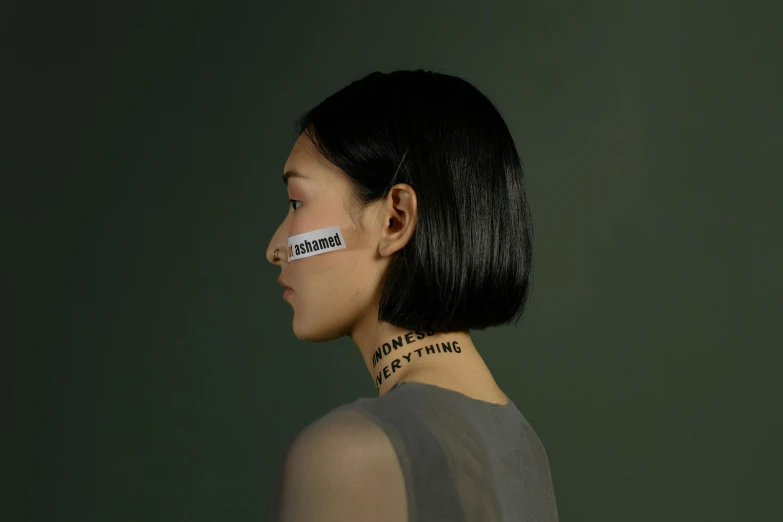 a woman with a tape on her neck, inspired by Kim Tschang Yeul, trending on pexels, permanent marker, grimes, above meaning, half human face