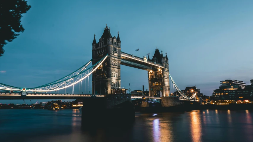 the tower bridge is lit up at night, pexels contest winner, unsplash 4k, simple, ilustration, stacked image