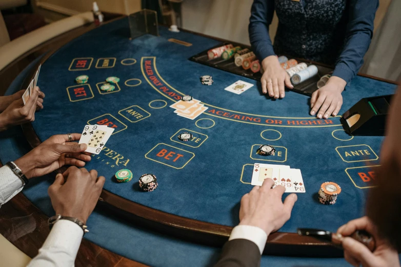 a group of people playing a game of blackjack, a screenshot, pexels contest winner, renaissance, on a table, upscale photo, 🦩🪐🐞👩🏻🦳, court session images