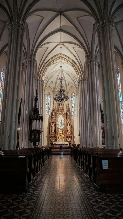 the inside of a church with pews and stained glass windows, a picture, by Jacob Burck, unsplash contest winner, buenos aires, tall spires, gif, panorama view