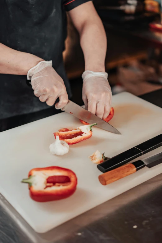 a person cutting tomatoes on a cutting board, pexels contest winner, art nouveau, as chefs inside cthulhu, sleek hands, plastic wrap, beveled edges