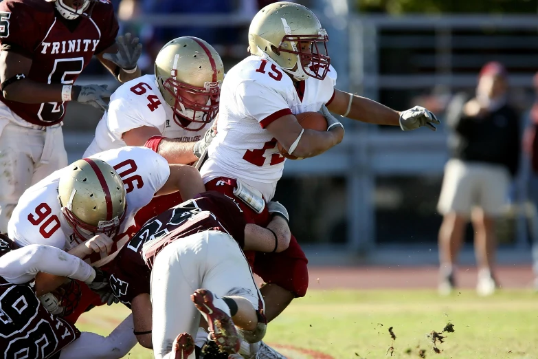 a group of young men playing a game of football, a digital rendering, by Douglas Shuler, pexels, maroon, high-speed sports photography, red white and gold color scheme, piled around