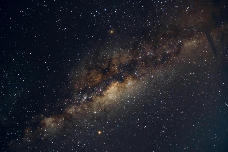 a night sky filled with lots of stars, pexels, space art, southern cross, neck zoomed in, brown, the milk way