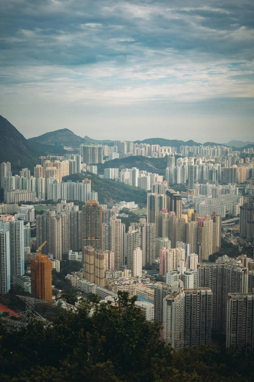 a view of a city from the top of a hill, inspired by Thomas Struth, pexels contest winner, hong kong buildings, “ aerial view of a mountain, 8k detail post processing, multiple stories