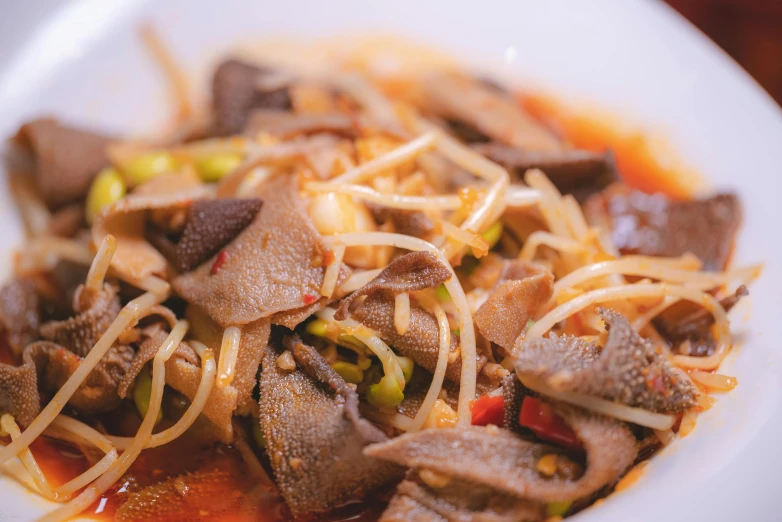 a close up of a plate of food on a table, a picture, unsplash, mingei, spicy, shrooms, square, longque chen