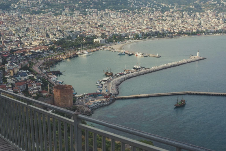 a large body of water next to a city, pexels contest winner, cyprus, demna gvasalia, port, acrophobia