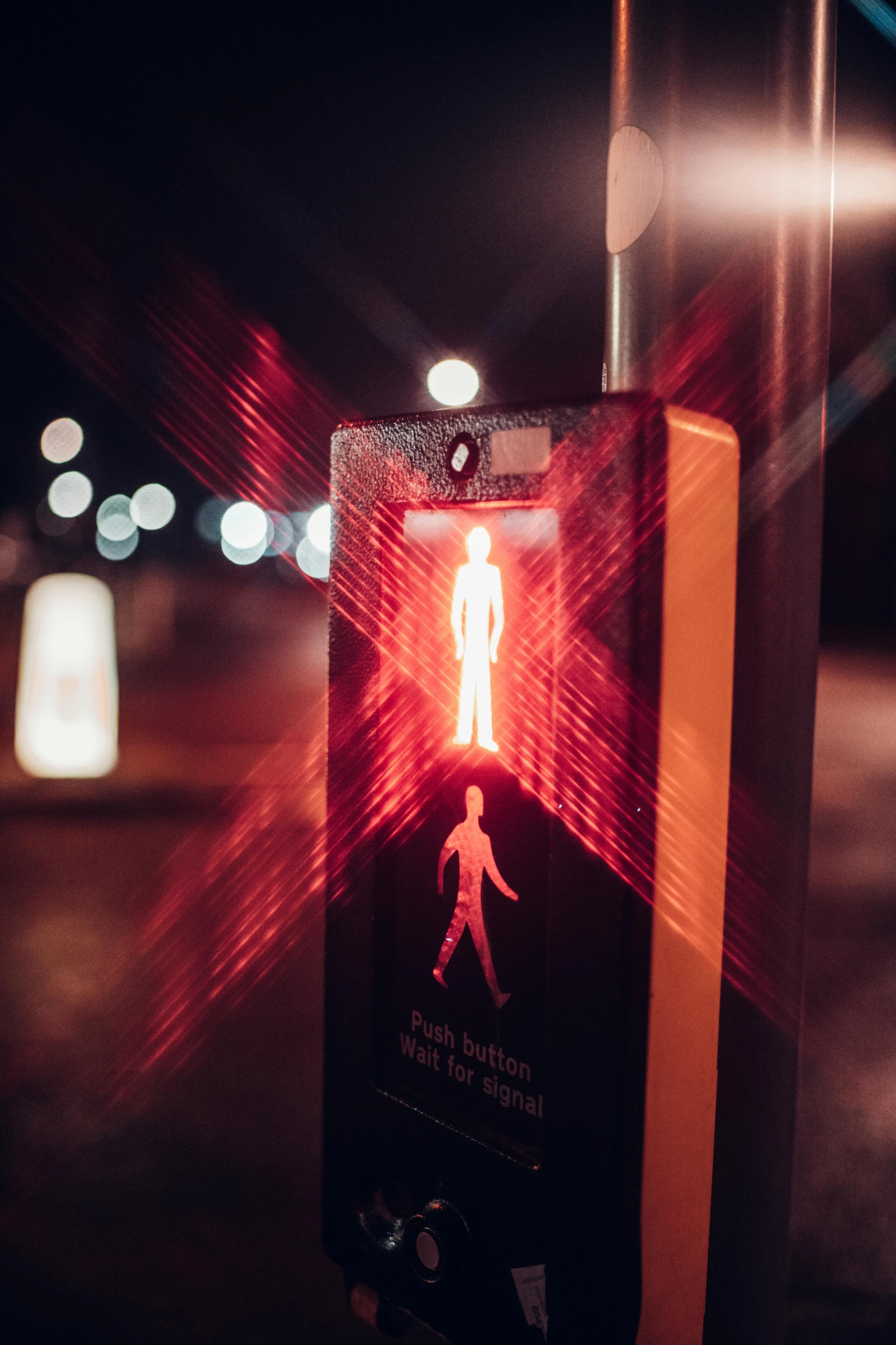 a red traffic light sitting on the side of a road, a hologram, by Jesper Knudsen, glowing people, street signs, warm light, a close up shot