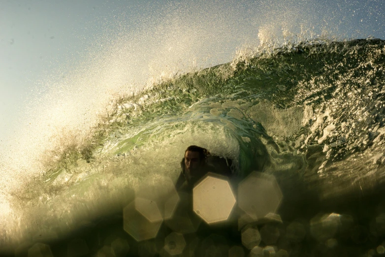 a man riding a wave on top of a surfboard, by Tom Bonson, unsplash contest winner, looking through a portal, gnarly details soft light, green light, in a sunbeam