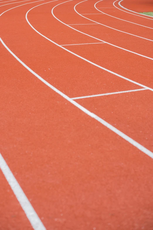 a man riding a skateboard on top of a red track, zoomed out, square, thumbnail, sprinters in a race